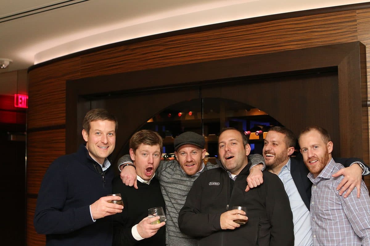 James arm in arm with a group of friends on a night out