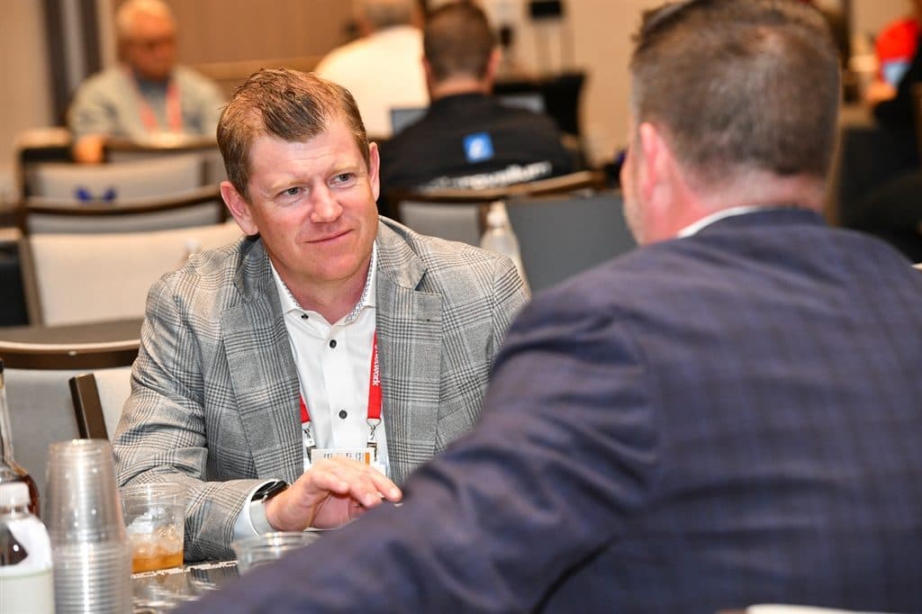 James in conversation at an industry conference