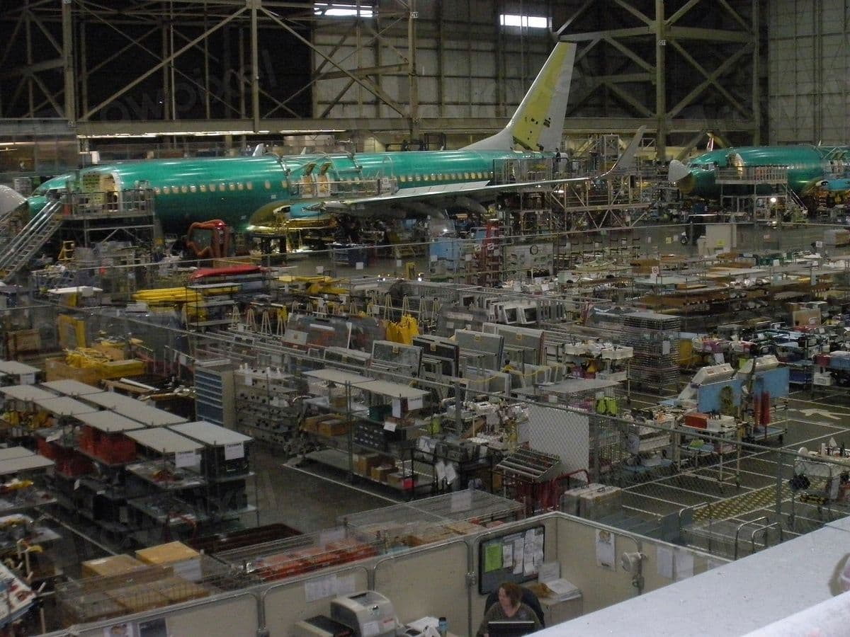Aircraft assembly plant floor with airliners under construction