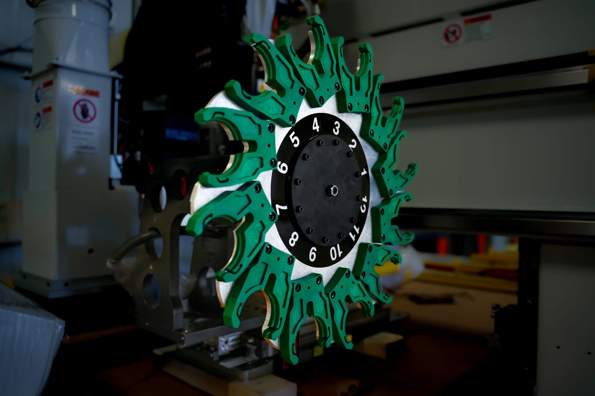 Rotary tool changer carousel on a CNC router