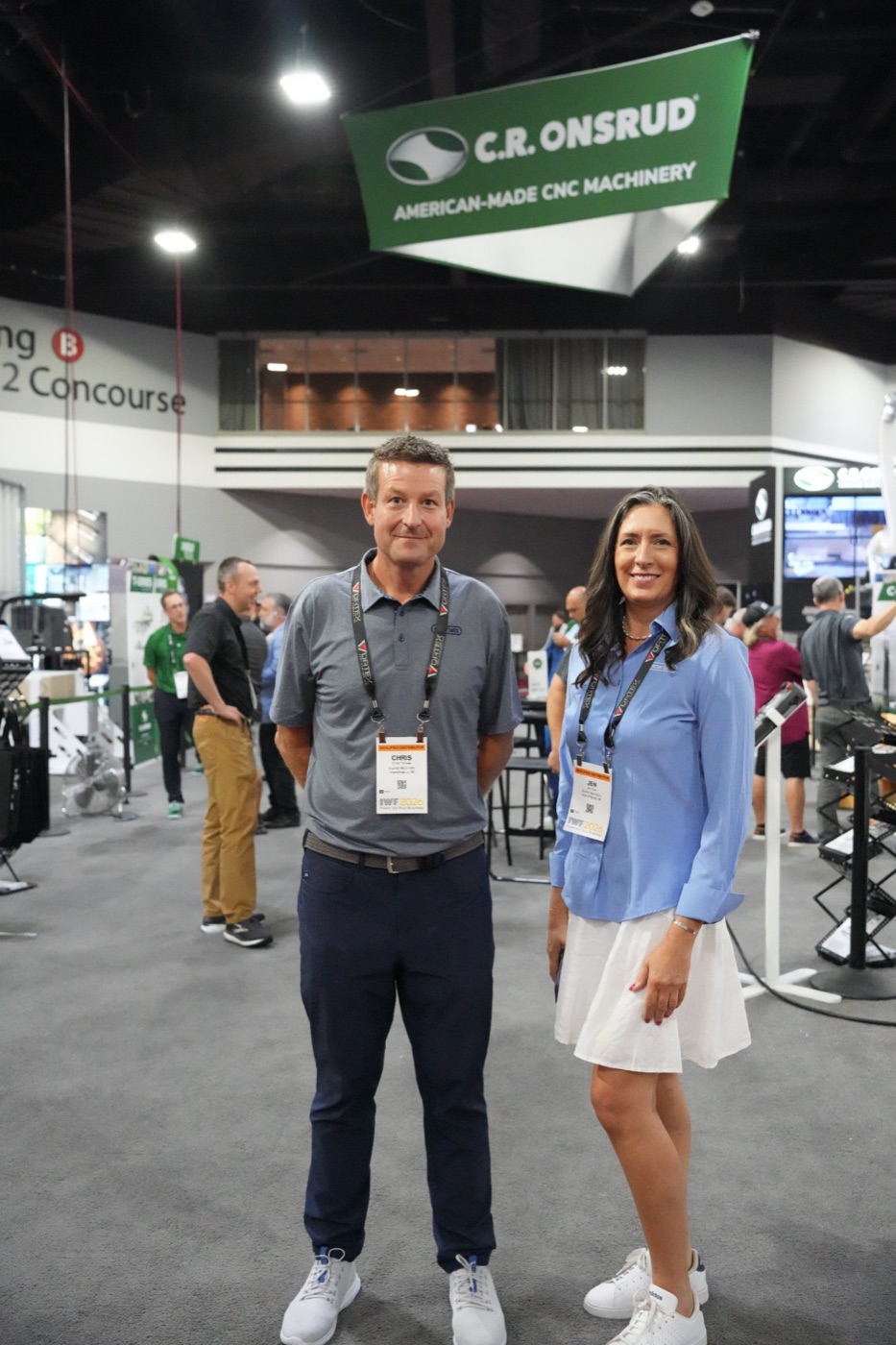 Two Scarlett team members on the IWF show floor in Atlanta