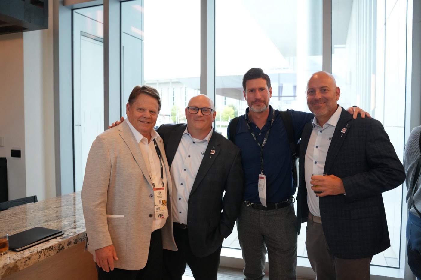 Four guests in sport coats at the Signia by Hilton Atlanta