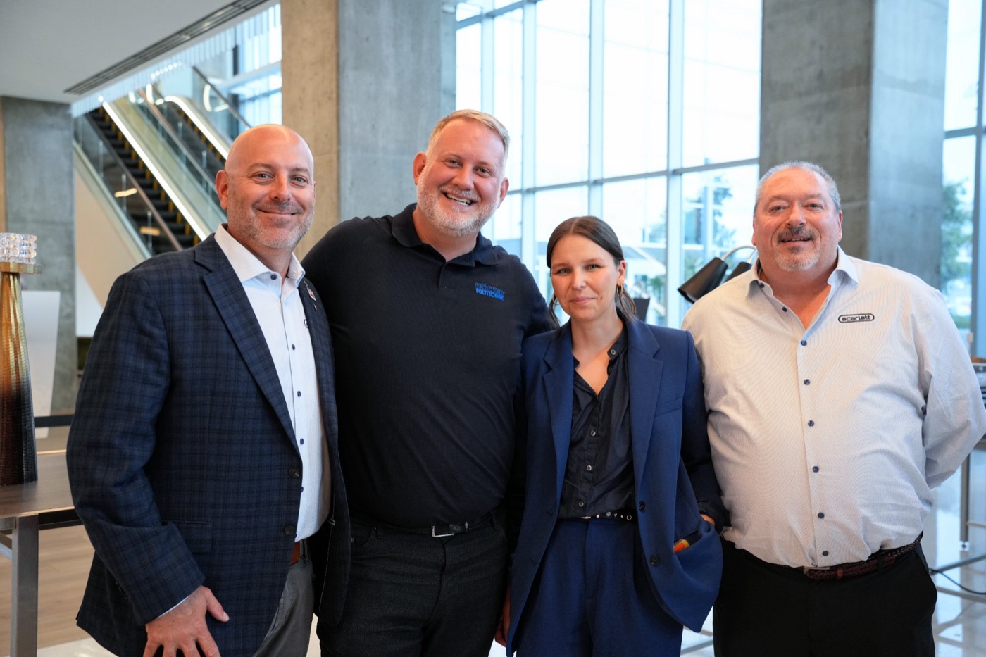 Five guests posing together at the Scarlett cocktail hour
