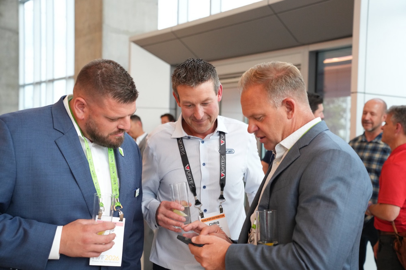 Guests talking over drinks at the cocktail hour